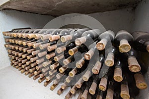 Wine cellar, a row of bottles.