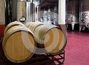 Wine cellar with wooden and stell barrels