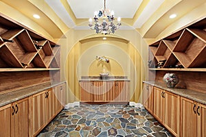 Wine cellar with yellow walls