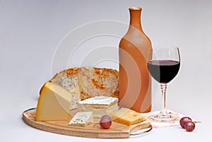 Wine and cheese still life