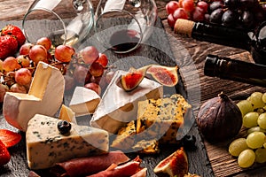 Wine and cheese still life, Food recipe background. Close up