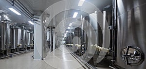 Wine cisterns under temperature control in winery