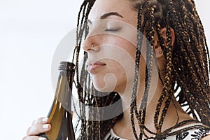 Wine connoisseur enjoys freshly uncorked wine's fragrance
