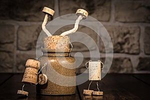 Wine cork figures, Concept sticking in a pot