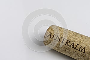 Wine cork isolated on the white. Recording the Country Name Australia photo