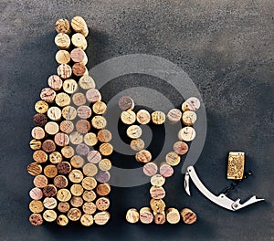 Wine corks arranged in shape of bottle and glass