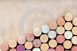 Wine corks background. Used wine corks arranged diagonally on blurred light background