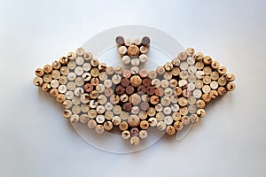 Wine corks bat silhouette on white background