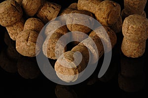 Wine corks on black background