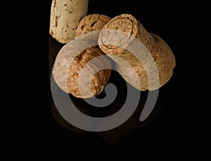 Wine corks on black background