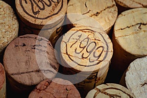 Wine corks isolated on black background closeup with 1999 close-up