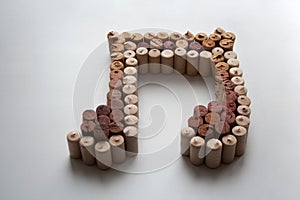 Wine corks music note on white background