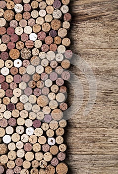 Wine corks on rustic wooden photo