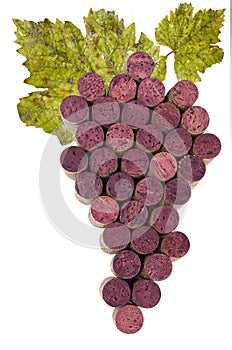 Wine corks in the shape of a group of grapes with a green leaf