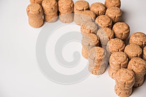 Wine corks with the top right side of the frame on a white background