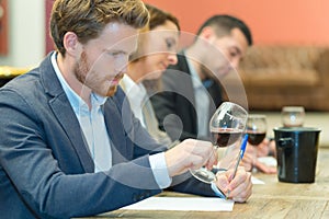 Wine expert specialist tasting glass wine