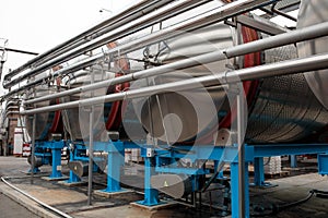 Wine Fermenting in huge vats. modern wine production plant