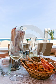 Wine and focaccia before lunch in the restaurant, Italy, Riccione