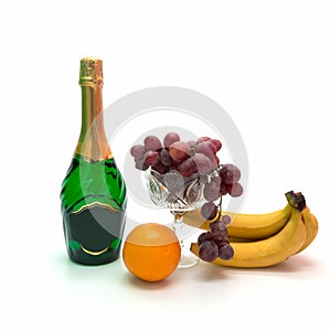 Wine and fruits on a white background.