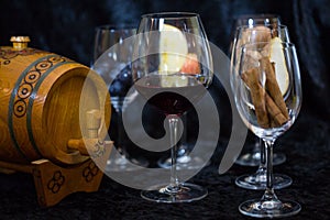 Wine glases, aromatic barrel, cinnamon, tasting