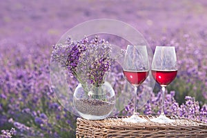 Wine glass against lavender.