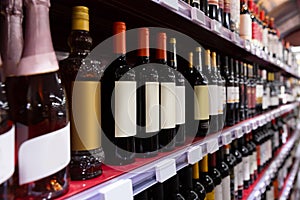 Wine in glass bottles in supermarket