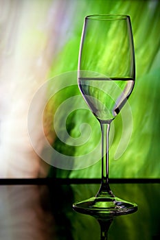 Wine glass with colorful background