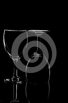 Wine glass photographyand  product photography using light effects and low light on a black background