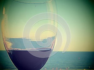 wine glass and seabed in green tones photo
