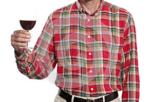 Wine glass toast concept: man rising up a glass of red wine isolated on white background with clipping path included