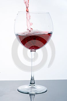 Wine in glass on white bacground