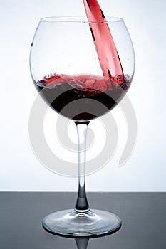 Wine in glass on white bacground