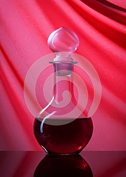 Wine. Glass of wine on red background