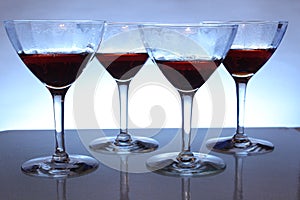Wine Glasses With A Blue Background