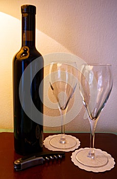 Wine glasses and a bottle of fine red wine. Lugano, Ticino canton, Switzerland