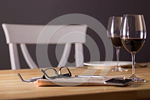 Wine glasses bottle smartphone and glasses