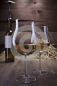 Wine glasses and bottles photo