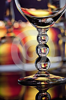 Wine glasses with colorful background