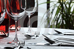 Wine Glasses and cutlery in restaurant