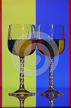 Wine glasses in front of colors