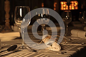 Wine glasses on served table in restaurant