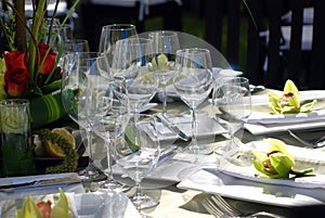 Place settings at an outdoor party.