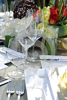 Place settings at an outdoor party.