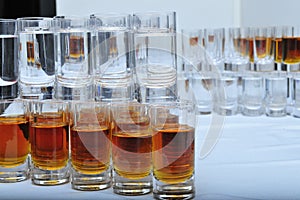 Wine glasses with vodka and cognac