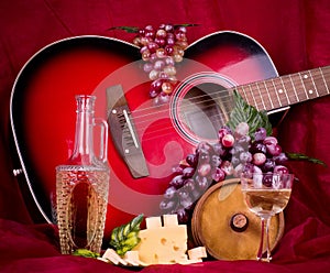 Wine, grape, cheese and guitar