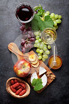 Wine, grape, cheese, sausages