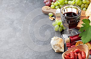 Wine, grape, cheese, sausages