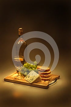 Wine, grapes, cheese and bread