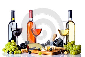 Wine grapes and cheese on white