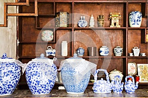 Wine jars lined up inside a drinkery